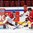 HELSINKI, FINLAND - DECEMBER 27: Denmark's Thomas Lillie #31 makes a pad save with Christian Mieritz #12 and Switzerland's Pius Suter #24 battling in front during preliminary round action at the 2016 IIHF World Junior Championship. (Photo by Matt Zambonin/HHOF-IIHF Images)

